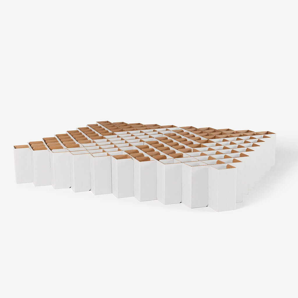 set up bed frame for Bett 2.0, which is eco-friendly, 100% recyclable cardboard furniture manufactured by RIAB USA