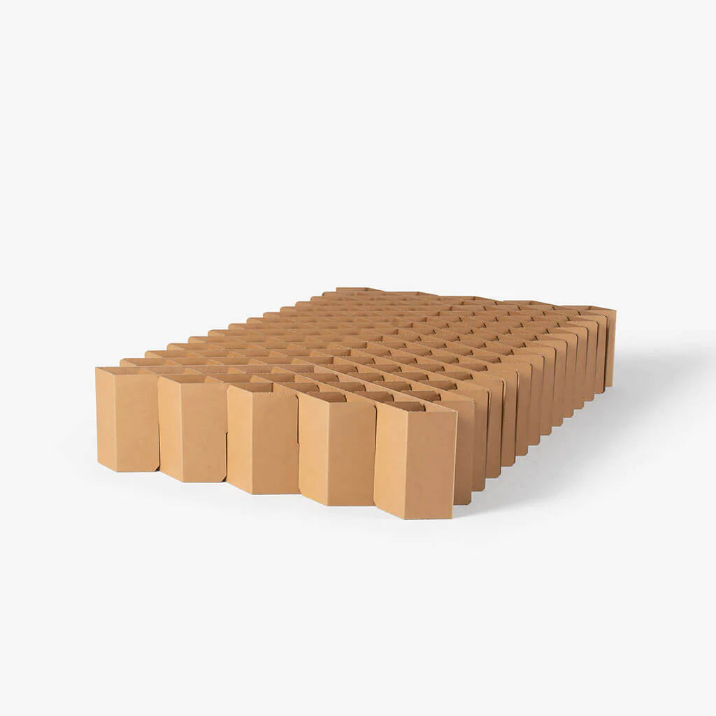 set up bed frame for Bett 2.0, which is eco-friendly, 100% recyclable cardboard furniture manufactured by RIAB USA